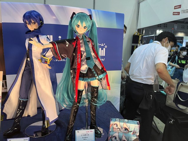 A figure of Hatsune Miku is displayed at an event at a Tokyo suburban hall, Makuhari Messe, in Chiba, Japan, Friday, September 1, 2023, in celebration of her 16th birthday. Hatsune Miku has always been 16 years old and worn long aqua ponytails. She is Japan's most famous Vocaloid, a computer-synthesized singing voice software that, in her case, comes with a virtual avatar. (Photo by Yuri Kageyama/AP Photo)