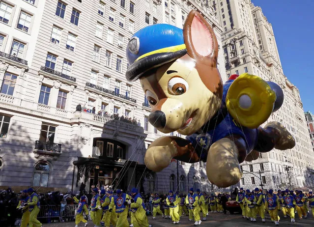 A float hovers above the crowd during the Macy's Thanksgiving Day Parade in Manhattan,New York, U.S., November 22, 2018. (Photo by Brendan McDermid/Reuters)