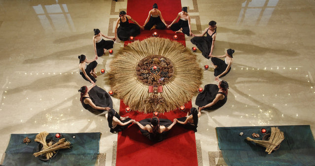 Legend Lin Dance Theatre dancers perform “The Eternal Tides” during a press event at the National Theater Concert Hall in Taipei, Taiwan, Monday, January 9, 2017. Taiwanese artistic director and choreographer Lee-Chen Lin has dedicated to the collection and preservation of the traditional cultures of Taiwan, particularly dance and music elements in the religious rituals and ceremonial rites, and then incorporated these elements into her choreography of “The Eternal Tides”. The dance will be performed in March at the hall. (Photo by Chiang Ying-ying/AP Photo)