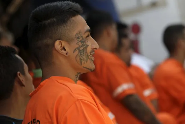 An inmate with a tattoo of Santa Muerte (The Saint of Death) looks on in the Topo Chico prison, during a media tour, in Monterrey, Mexico, February 17, 2016. (Photo by Daniel Becerril/Reuters)