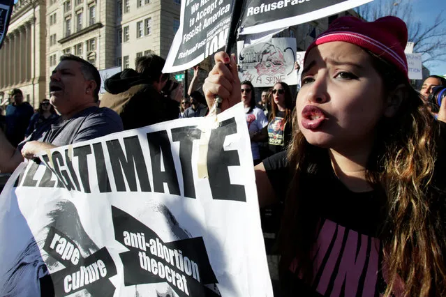 Anti-Trump protesters march towards the White House during the “Not My President's Day” rally in Washington, U.S., February 20, 2017. (Photo by Yuri Gripas/Reuters)