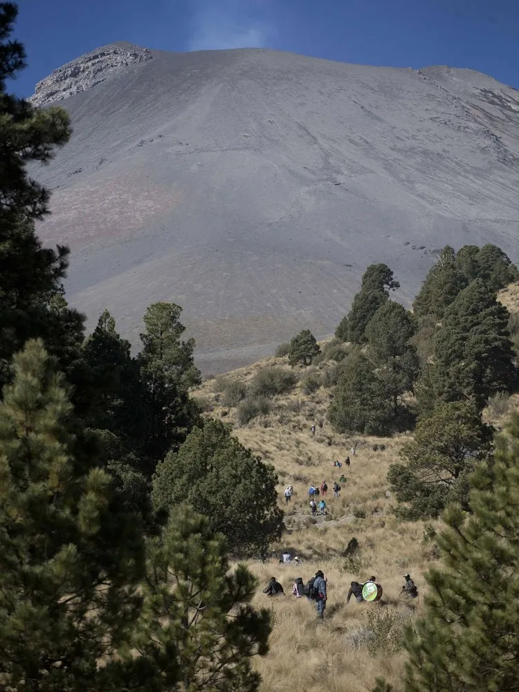 Pilgrims on the Slopes of Popocatepetl Volcano in Mexico