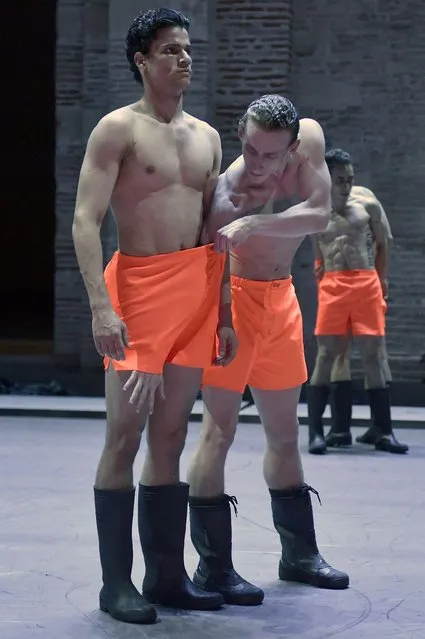 Members of the Ballet du Capitole in Toulouse dance on April 13, 2016 in the Auditorium Saint-Pierre des Cuisines in Toulouse part of a new show entiled “Mur Mur or Walls Walls” directed and choreographed by the company's director Kader Belardi. Kader Belardi is presenting his new show “Paradise Lost”, a ballet in three parts including two creations “Mur-Mur” and “A Thousand of Thoughts” by Spanish choreographer Angel Rodriguez. (Photo by Pascal Pavani/AFP Photo)