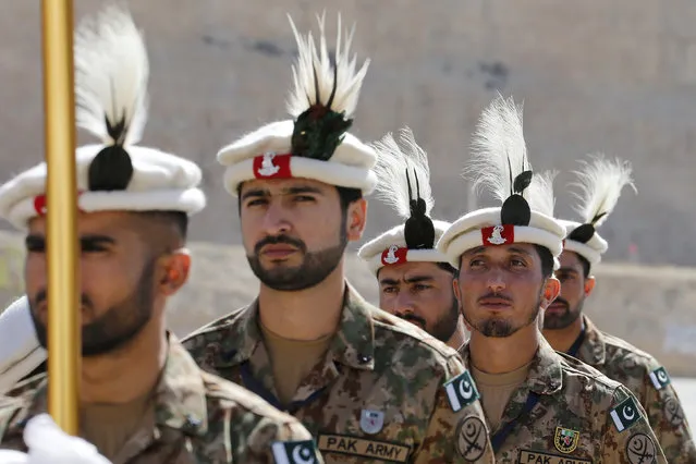 Members of the Pakistani team stand to attention during the opening ceremony of eighth annual Warrior Competition at the King Abdullah Special Operations Training Center (KASOTC) in Amman, Jordan, May 2, 2016. (Photo by Muhammad Hamed/Reuters)