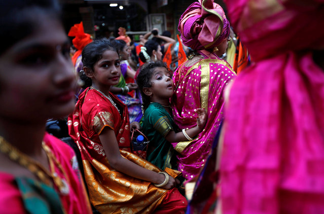 Girls dressed in traditional costumes attend celebrations to mark the Gudi Padwa festival, the beginning of the New Year for Maharashtrians, in Mumbai, India March 28, 2017. (Photo by Shailesh Andrade/Reuters)