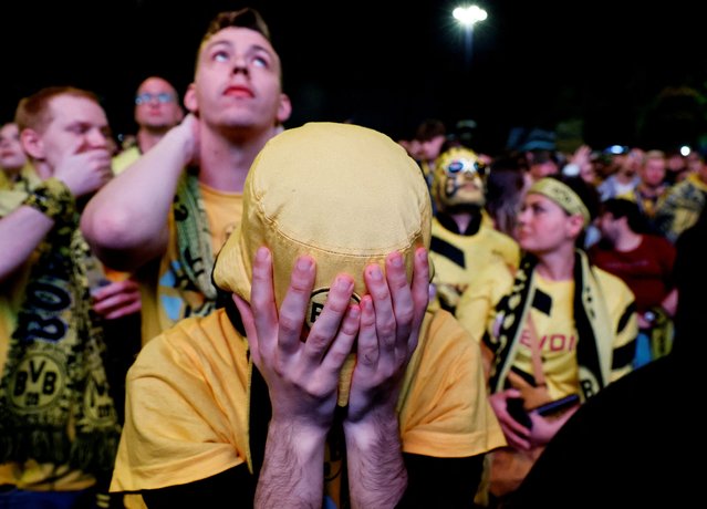 A Borussia Dortmund fan reacts as he watches the Champions League final match from Dortmund, Germany on June 1, 2024. (Photo by Wolfgang Rattay/Reuters)