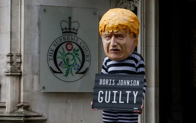 A protester dressed as Boris Johnson outside The Supreme Court on September 24, 2019 in London, England. (Photo by Hollie Adams/Getty Images)