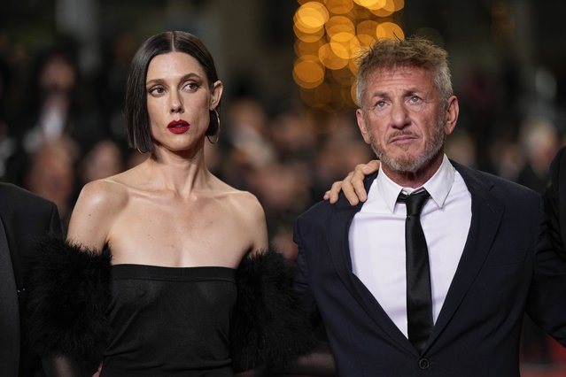 Movie actress Raquel Nave, left, and American actor Sean Penn pose for photographers upon arrival at the premiere of the film “Black Flies” at the 76th international film festival, Cannes, southern France, Thursday, May 18, 2023. (Photo by Scott Garfitt/Invision/AP Photo)