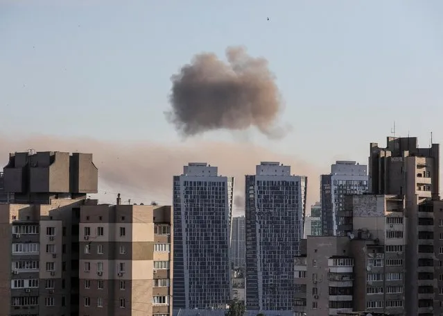 Smoke rises after a missile strike in Kyiv, Ukraine, June 26, 2022. (Photo by Gleb Garanich/Reuters)