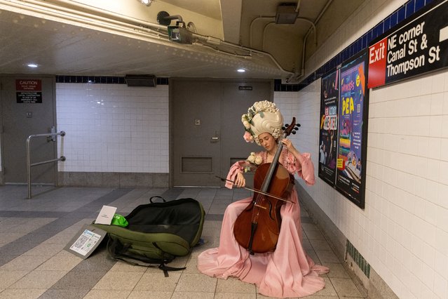 A person wearing a costume performs at a subway station before annual village Halloween parade in New York City on October 31, 2024. (Photo by Jeenah Moon/Reuters)