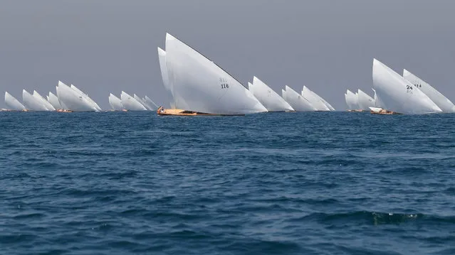 Competitors sail their boats in the annual long-distance “60ft Dubai Traditional Dhow Sailing Race” in the United Arab Emirates, on March 7, 2020. (Photo by Karim Sahib/AFP Photo)