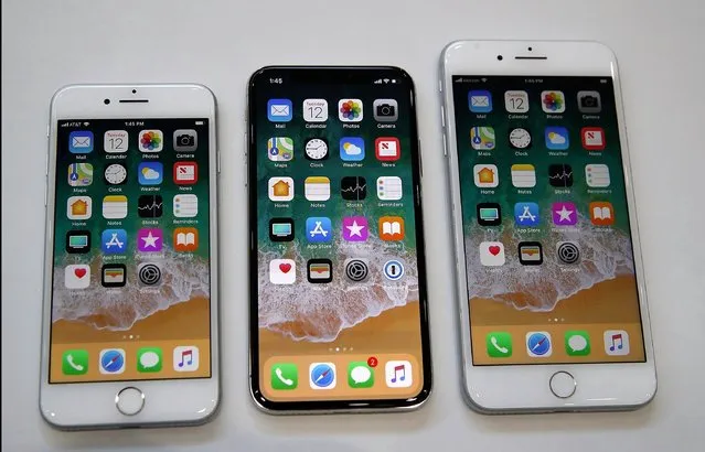 (L-R) The new iPhone 8, iPhone X and iPhone 8S are displayed during an Apple special event at the Steve Jobs Theatre on the Apple Park campus on September 12, 2017 in Cupertino, California. Apple held their first special event at the new Apple Park campus where they announced the new iPhone 8, iPhone X and the Apple Watch Series 3. (Photo by Justin Sullivan/Getty Images)