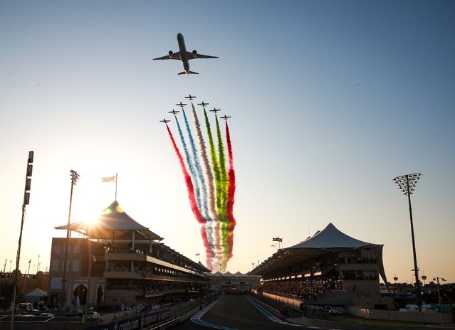 xEtihad Airways fly past and aerobatic display by Al Fursan during the UAE national anthem on Sunday, November 26, 2023. (Photo by Victor Besa/The National)