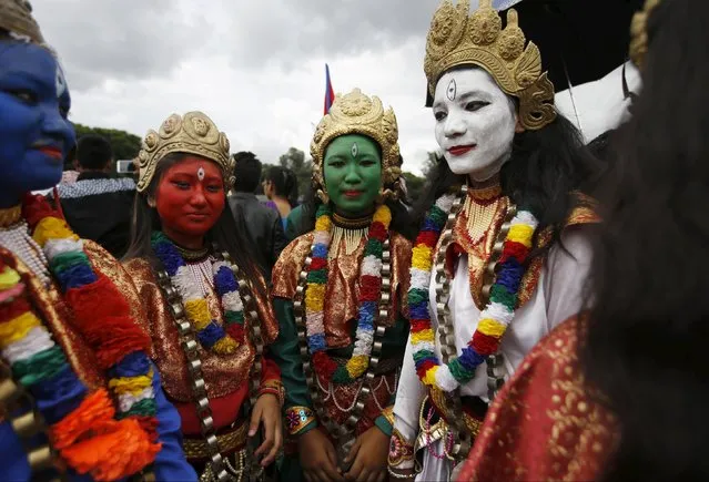 Women with their faces painted as various Hindu deities take part in a celebration a day after the first democratic constitution was announced in Kathmandu, Nepal September 21, 2015. (Photo by Navesh Chitrakar/Reuters)