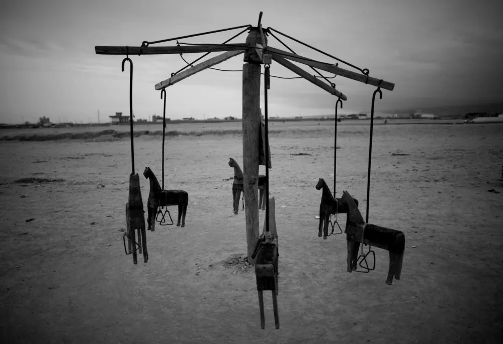 “Life in War” by Iranian Photographer Majid Saeedi