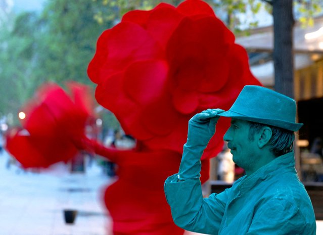 Live statue artists perform to mark World Art Day in Skopje, North Macedonia, on April 15, 2025. (Photo by Ognen Teofilovski/Reuters)