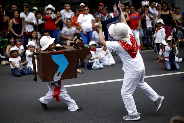 Schoolchildren perform during a parade commemorating Costa Rica's Independence Day in San Jose, Costa Rica, September 15, 2016. (Photo by Juan Carlos Ulate/Reuters)