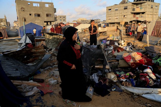 Palestinians inspect the damage at the site of an overnight Israeli air strike on a tent sheltering displaced people, in Khan Younis, southern Gaza Strip, on July 2, 2025. (Photo by Hatem Khaled/Reuters)