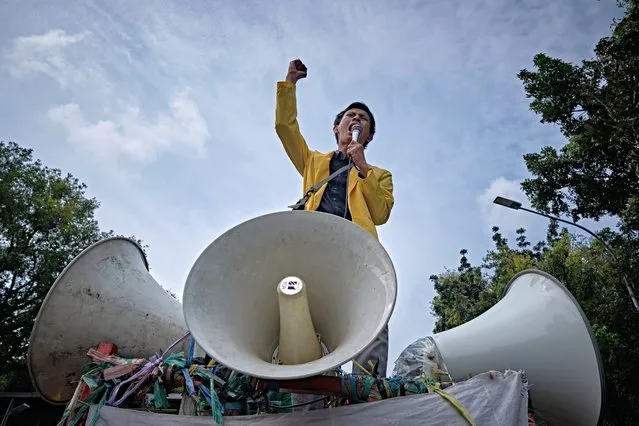 A student leader gives a speech against the new Omnibus law on October 20, 2020 in Jakarta, Indonesia. Students have gathered across Indonesia to protest a new labor law the government claims will boost economic recovery needed due to coronavirus supporting claims that the bill will reduce labor conditions and environmental protections. The students also object to calls for students not to participate in protests and alleged incidents of police brutality. (Photo by Ed Wray/Getty Images)