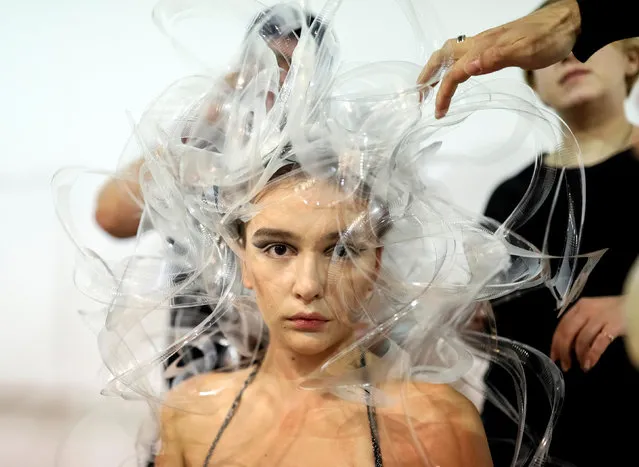 A model prepares backstage at Ukrainian Fashion Week in Kiev, Ukraine, October 12, 2016. (Photo by Gleb Garanich/Reuters)