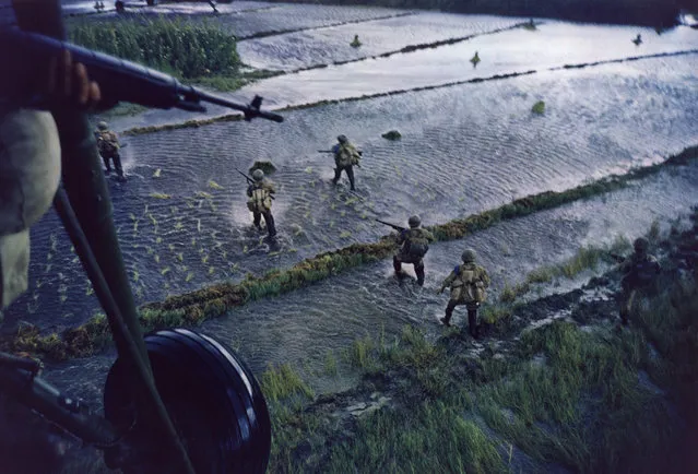 Dropping of troops in support of the South Vietnamese, 1962, Mekong Delta, 1962. (Photo by Larry Burrows/AP Photo)