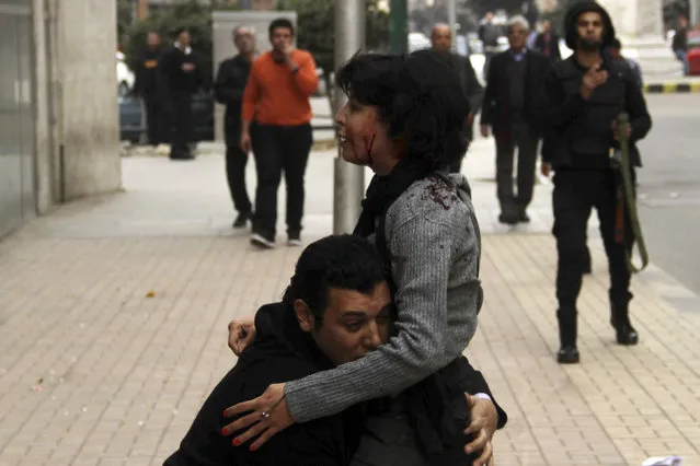 Socialist Popular Alliance Party (SPAP) activist Shaimaa al-Sabbagh receives help after she was shot during a protest by the party in Cairo January 24, 2015. (Photo by Reuters/Al Youm Al Saabi Newspaper)