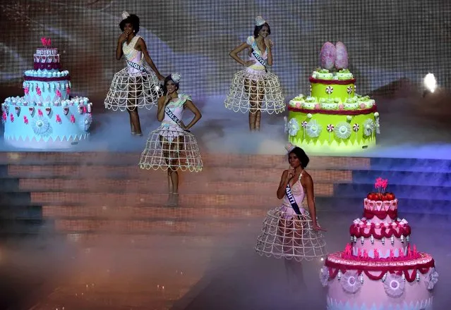 Contestants appear on stage during the Miss France 2016 beauty contest on December 19, 2015 in Lille. (Photo by Philippe Huguen/AFP Photo)