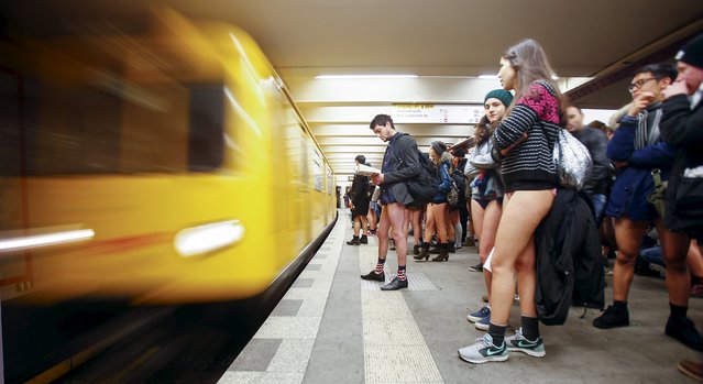 People take part in the 'No Pants Subway Ride' in Berlin, January 10, 2016. (Photo by Hannibal Hanschke/Reuters)