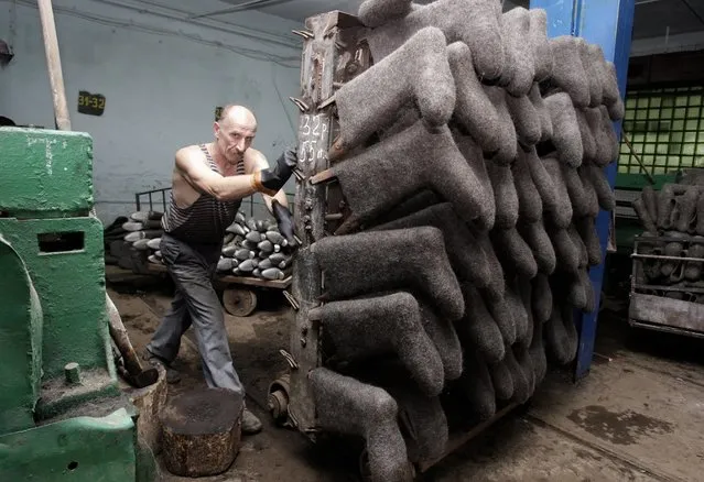 "Valenki. Belarusian workers works at a felt boot factory in Smilovichi, some 35km from Minsk, Belarus