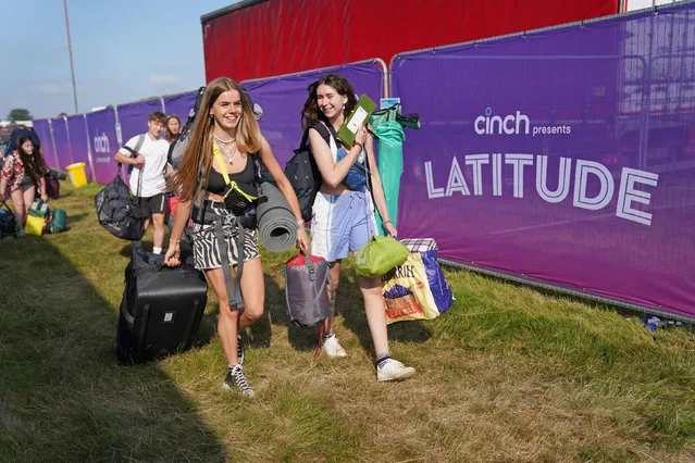 Festivalgoers arrive at the Latitude festival in Henham Park, Southwold, Suffolk, United Kingdom on Thursday, July 22, 2021. (Photo by Jacob King/PA Images via Getty Images)