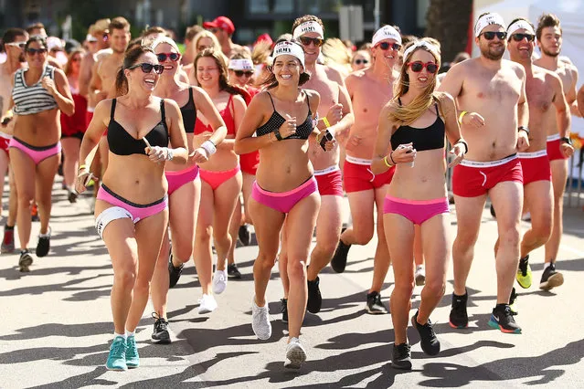 Contestants wearing their underwear  take part in Cupids Undie Run on February 14, 2016 in Melbourne, Australia. Cupid's Undie Run is an annual charity event. The fun run  encourages people to run in their best pair of undies is held on Valentine's Day and raises money for the Children's Tumour Foundation of Australia. Cupid's Undie Run takes place in 36 cities worldwide and raised $3.5 million last year. (Photo by Scott Barbour/Getty Images)