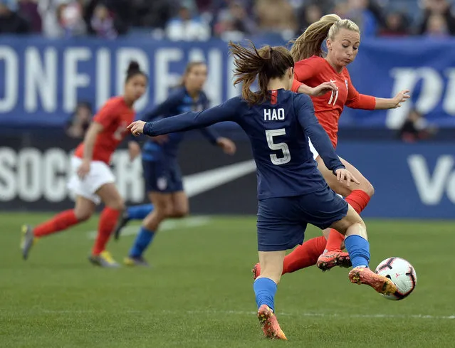 United States defender Kelley O'Hara (5) plays against England forward Toni Duggan (11) during the first half of a SheBelieves Cup women's soccer match Saturday, March 2, 2019, in Nashville, Tenn. O'Hara honors Heather O'Reilly “HAO” by wearing her name on the back of her jersey. (Photo by Mark Zaleski/AP Photo)