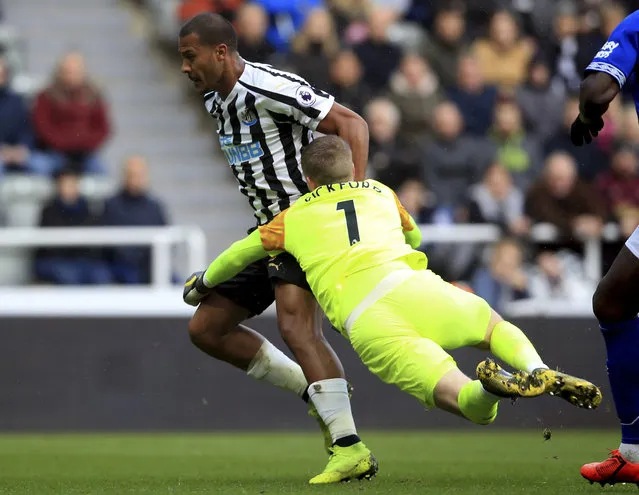 Everton goalkeeper Jordan Pickford brings down Newcastle United's Salomon Rondon to concede a penalty during their English Premier League soccer match at St James' Park in Newcastle, England, Saturday March 9, 2019. (Photo by Owen Humphreys/PA Wire via AP Photo)