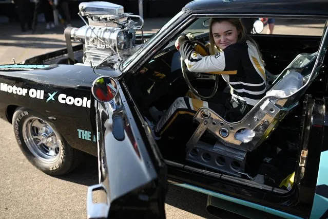 Racing driver Charlotte Birch prepares to drive a drag car at 'The Speed Show' held at Elvington Airfield, near York, northern England on February 24, 2024. The Speed Show, hosted by 'Straightliners' takes place on February 24th and 25th and features 200 vehicles on display as well as drag racing and performance car displays. (Photo by Oli Scarff/AFP Photo)