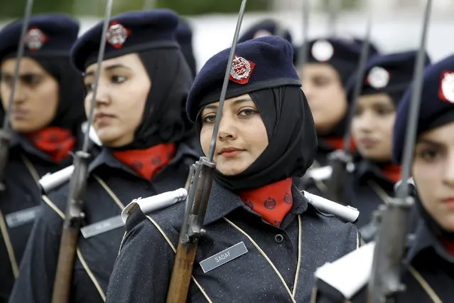 Police academy graduates march during their graduation ceremony in Islamabad, Pakistan May 18, 2015. (Photo by Caren Firouz/Reuters)