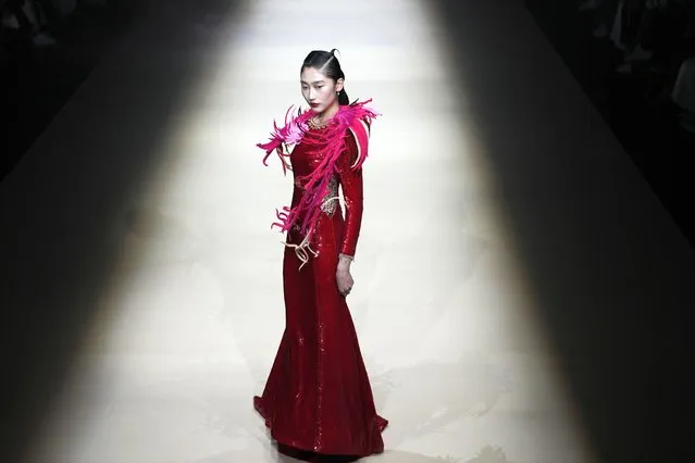 A model wears the creation for Nancy Sun by Yao Sun during China Fashion Week in Beijing, Thursday, March 28, 2024. (Photo by Ng Han Guan/AP Photo)