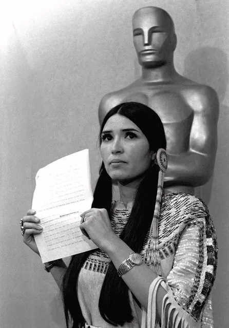 Sasheen Littlefeather holds up a statement that she read March 23, 1973, at the Academy Awards ceremony in Los Angeles on behalf of Marlon Brando who declined to accept his Oscar as best actor in to protest the treatment of Native Americans in television and movies. The Academy Awards have gone through many changes since the first ceremony in 1929. (Photo by AP Photo)