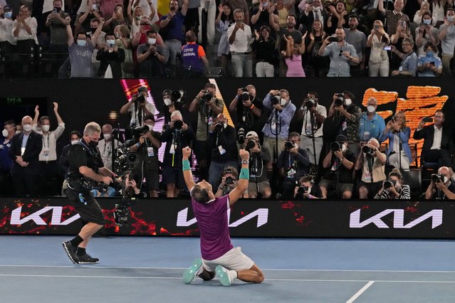 Rafael Nadal of Spain celebrates after defeating Daniil Medvedev of Russia during the men's singles final at the Australian Open tennis championships in Melbourne, Australia, Monday, January 31, 2022. (Photo by Simon Baker/AP Photo)