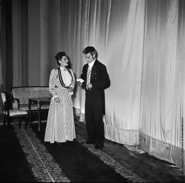 1950: Two actors from a production of Oscar Wilde's play, 'Lady Windemere's Fan' talk back-stage at the Theatre Saadi in Tehran