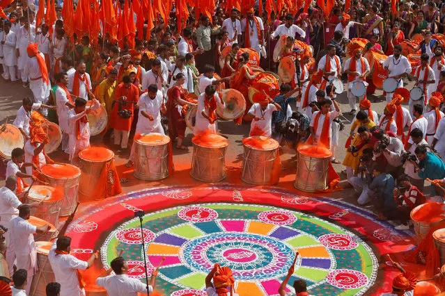 People play drums as they attend celebrations to mark the Gudi Padwa festival, the beginning of the New Year for Maharashtrians, in Mumbai, India March 28, 2017. (Photo by Shailesh Andrade/Reuters)