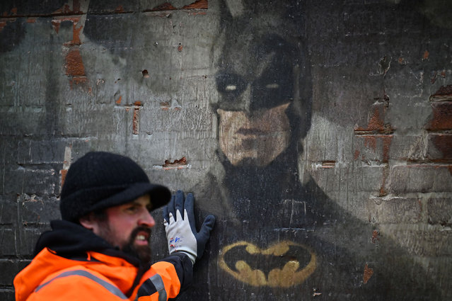 Crew dress the set of the new Batgirl movie on January 10, 2022 in Glasgow,Scotland. Roads in Glasgow city centre are being closed as film crews descend on the city for the upcoming Batgirl movie which will see Leslie Grace play the title role and a return of Michael Keaton in his role as Batman. (Photo by Jeff J. Mitchell/Getty Images)
