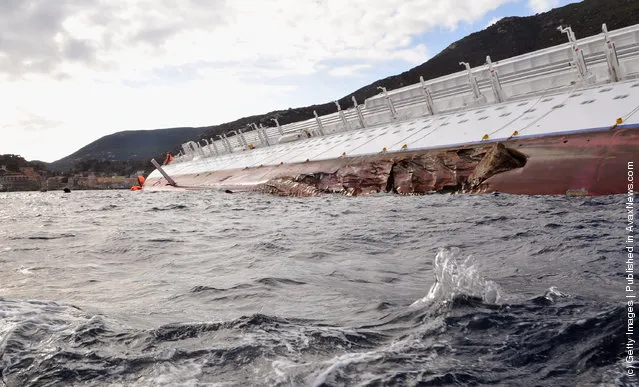 The cruise ship Costa Concordia lies stricken off the shore of the island of Giglio