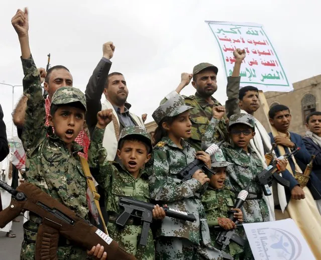 Boys join Houthi followers as they demonstrate against Saudi-led air strikes in Yemen's capital Sanaa July 24, 2015. A Saudi-led coalition of Arab states has been bombing the Iranian-allied Houthi rebel movement and army forces loyal to former Yemeni president Ali Abdullah Saleh since late March in a bid to restore exiled President Abd-Rabbu Mansour Hadi to power. (Photo by Khaled Abdullah/Reuters)