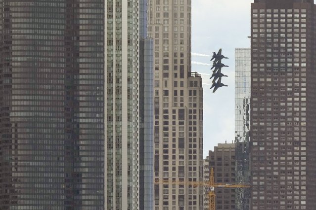 The U.S. Navy Blue Angels perform during Chicago's Air & Water Show over Lake Michigan Sunday, August 11, 2024. (Phoot by Charles Rex Arbogast/AP Photo)