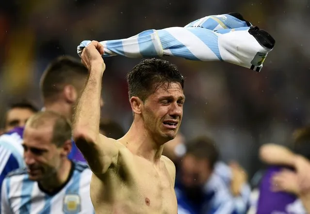 Argentina's Martin Demichelis cries after the team's 2014 World Cup semi-finals against Netherlands at the Corinthians arena in Sao Paulo July 9, 2014. (Photo by Dylan Martinez/Reuters)