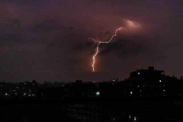 Photo taken on October 12, 2021 shows lightning over Cairo, in Egypt. (Photo by Ahmed Gomaa/Xinhua News Agency)