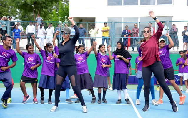 India's number one tennis player Sania Mirza and Bollywood star Neha Dhupia in action during the WTA Future Stars Masterclass with Sania Mirza and Neha Dhupia in Hyderabad, India on July 25, 2017. (Photo by Krishnendu Halder/Reuters Plus)