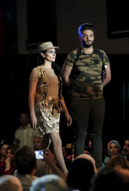 Models present creations by Iraqi designer Waffa Al-Shathar during a fashion show at the Hunting Club in Baghdad August 13, 2015. (Photo by Thaier al-Sudani/Reuters)