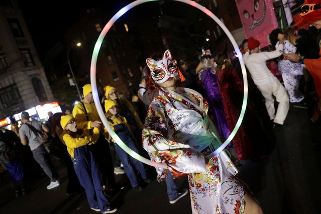 A person wearing a costume takes part in the annual NYC Halloween Parade in New York City on October 31, 2024. (Photo by Jeenah Moon/Reuters)