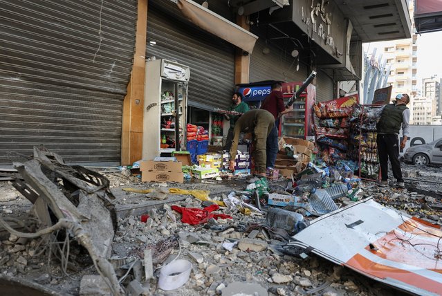 People inspect the damage in the aftermath of an Israeli strike in the Chiyah district of Beirut's southern suburbs, Lebanon on November 22, 2024. (Photo by Mohamed Azakir/Reuters)